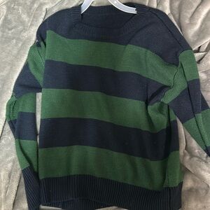 Green and blue striped sweater